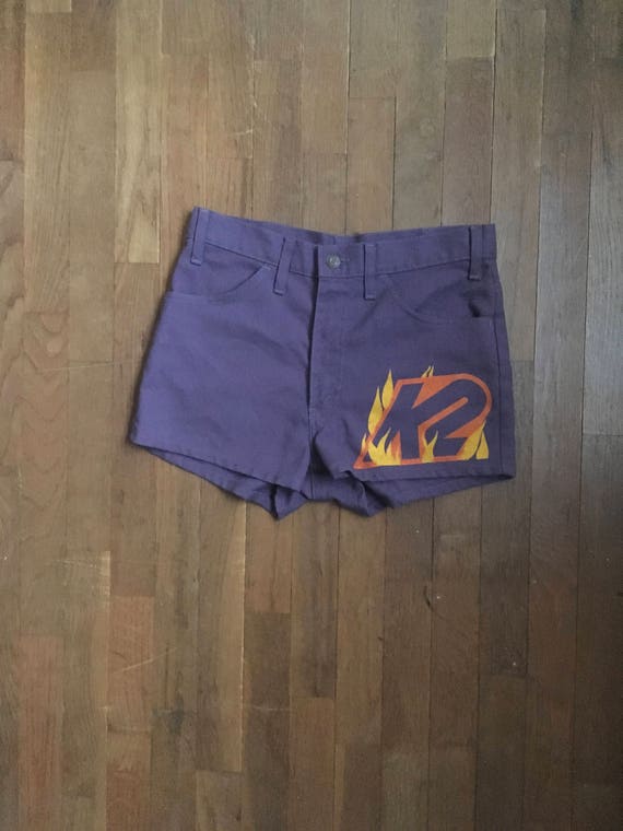 purple levi shorts