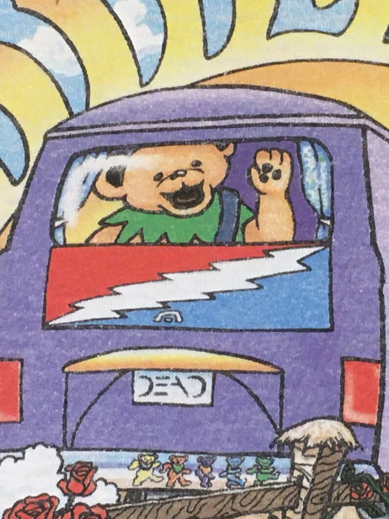 May include: A purple van with a red, white, and blue lightning bolt design on the back. A cartoon bear with a green shirt is driving the van and waving out the window. The van has a license plate that says "DEAD".
