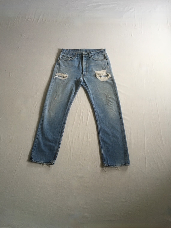 Levis 501 strappati deals