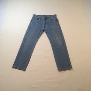 vintage 90s levis 501 blue jeans made in usa 35 x 31 silver tab button fly high waist red tab 1990s denim grunge punk hippie style