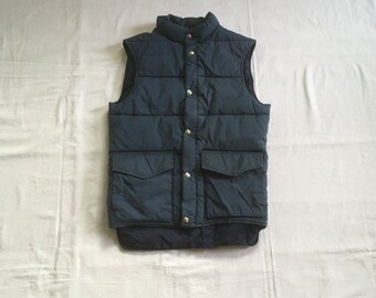 vintage 80s small woolrich quilted puffer vest blue nylon vegan polyester batted zip up sheep button snap outdoor camping hiking yardwork