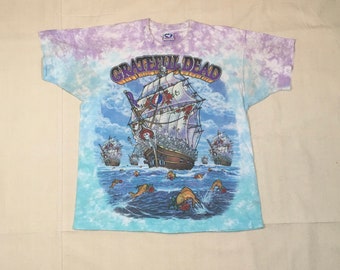 Camiseta vintage de los 90 de 1993 de Grateful Dead, modelo Ship of Fools, color azul líquido teñido con la técnica tie-dye, fabricada en EE. UU.