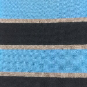 May include: Striped fabric with alternating black, light brown, and light blue stripes. The fabric has a knitted texture.