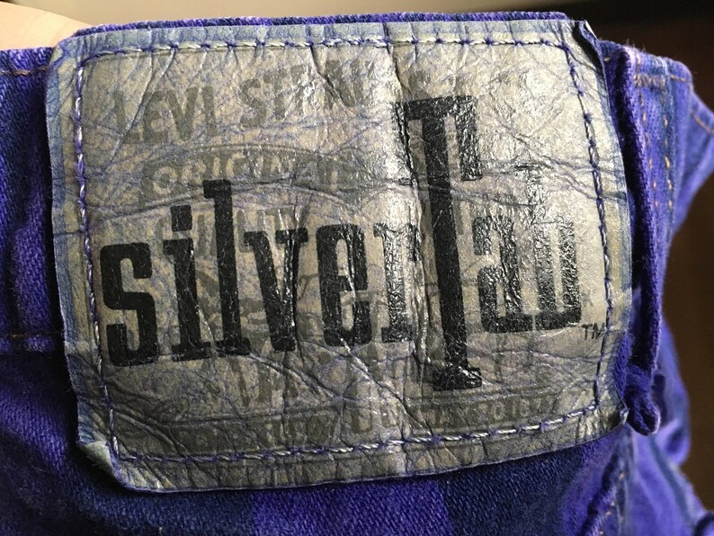 Vintage 90s levis silver tab baggy made in usa purple dyed