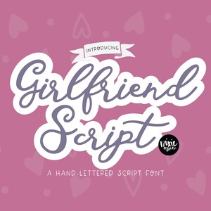 May include: A hand-lettered font called "Girlfriend Script" with a pink background and white hearts. The text "Introducing" is above the font name with a ribbon underneath. The text "A hand-lettered script font" is below the font name.