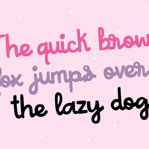 May include: A pink background with white polka dots features the text "The quick brown fox jumps over the lazy dog" in a handwritten font. The words "The quick brown" are in pink, "fox jumps over" are in purple, and "the lazy dog" are in black.
