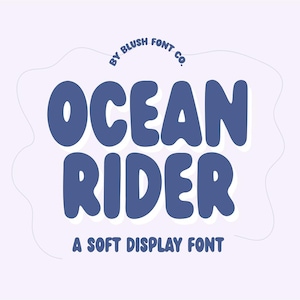 May include: Ocean Rider, a soft display font, is shown in a blue color with a white outline. The text is set against a light purple background. The font is designed by Blush Font Co.