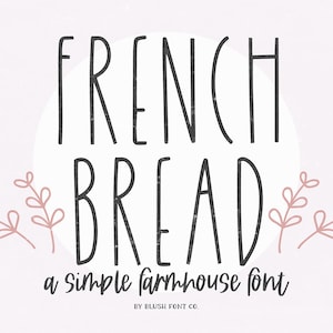 Könnte beinhalten: Ein schwarz-weißes Grafikdesign mit dem Text "French Bread" in einer handschriftlichen Schriftart. Der Text ist von einem Kreis und zwei rosa Blütenzweigen umgeben. Der Text darunter lautet "a simple farmhouse font" mit dem Text "BY BLUSH FONT CO." in kleinerer Schriftgröße.