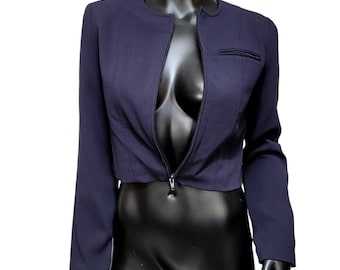 May include: A navy blue cropped blazer with a zipper closure and a pocket on the left side.