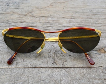 1990s Tortoise Shell and Gold STING Sunglasses by Colors In Optics, Italie