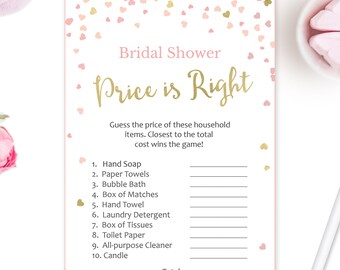 May include: A pink and gold bridal shower game called "Price is Right". The game asks guests to guess the price of 10 household items. The person who guesses closest to the total cost wins the game.