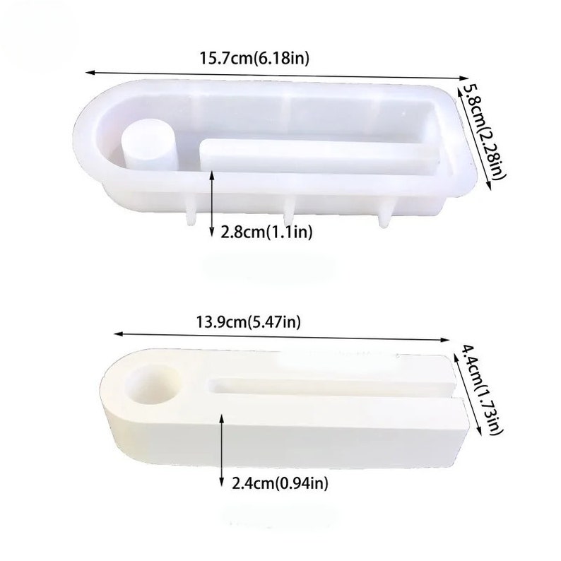 May include: Two white silicone molds for making resin crafts. The larger mold is 6.18 inches long, 2.28 inches wide, and 1.1 inches tall. The smaller mold is 5.47 inches long, 1.73 inches wide, and 0.94 inches tall.