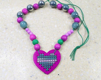 5606 long, embroidered necklace; green, pink necklace; embroidered pendant; heart necklace; large corals; acrylic and wood