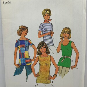 May include: A sewing pattern for four different tops. The pattern is for size 14 and is from Simplicity pattern number 7533. The tops are a striped top, a patchwork top, a yellow top with a chevron pattern, and a green top.