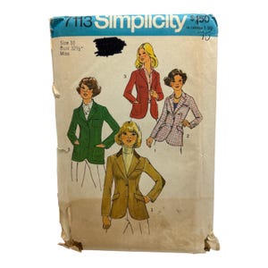 May include: A Simplicity 7113 sewing pattern envelope for a blazer in size 10 with a 32.5-inch bust. The front features illustrations of four blazer variations in green, red, tan, and a plaid pattern, with text including the brand name and size details.