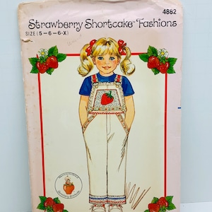 Vintage 1980s Strawberry Shortcake  Overalls Sewing Pattern Butterick 4882 Girl’s Coveralls with Pockets Sizes 5-6-6X UNCUT FF