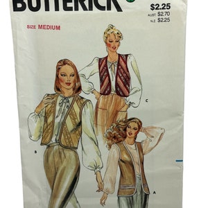 May include: A vintage sewing pattern for a vest, featuring three different styles. The pattern is from Butterick and is size medium. The pattern number is 3954 and the price is £2.25.