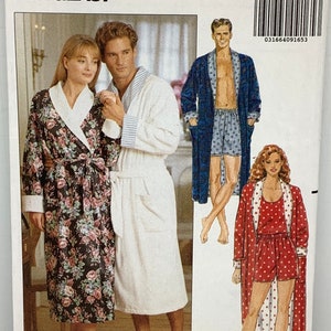 May include: A sewing pattern for a robe with a floral print, a white robe, and a red and white polka dot robe. The pattern is from Butterick and is for sizes XS-S-M. The pattern number is 5189.
