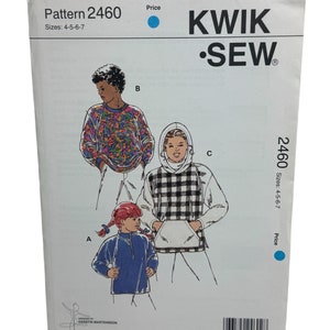 May include: A sewing pattern for children's clothing. The pattern is for sizes 4-5-6-7 and includes three different designs: a blue sweatshirt, a black and white checkered sweatshirt, and a colorful sweatshirt. The pattern is from Kwik-Sew Pattern Co., Inc.