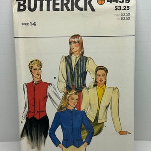 May include: A sewing pattern for a women's waistcoat. The pattern is from Butterick and the pattern number is 4459. The pattern includes three different styles of waistcoats. The first waistcoat is a blue waistcoat with a mandarin collar. The second waistcoat is a red waistcoat with a mandarin collar. The third waistcoat is a white waistcoat with a shawl collar.
