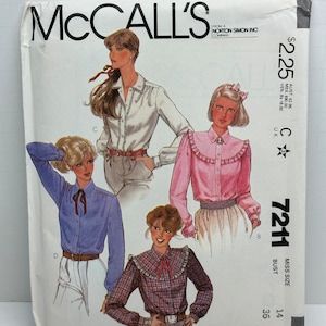 May include: McCall's sewing pattern number 7211 for a women's blouse. The pattern includes four different styles of blouses with long sleeves and a variety of collars and cuffs. The pattern is for a size 14, bust 36.