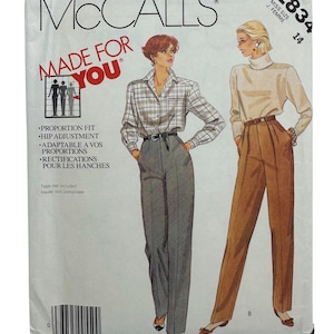 May include: McCall's sewing pattern envelope with illustrations of women's clothing. The envelope includes the text "MADE FOR YOU" and details about proportion fit and hip adjustment. The pattern number is 2834, size 14.