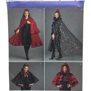 May include: Simplicity sewing pattern featuring four different cape designs. The capes are in various colors, including red and black, with different styles, such as a hooded cape and a cape with a ruffled hem. The pattern includes the text "1294 OS".