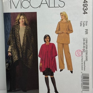 May include: Sewing pattern for a women's cape, with two different styles shown. The first style is a leopard print cape, and the second style is a solid red cape. The pattern is for sizes 18W-20W-22W-24W, or 36-38-40-42 inches.