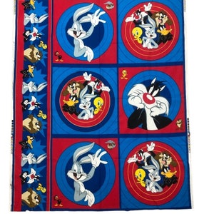 May include: A red and blue fabric featuring a repeating pattern of cartoon characters. The characters include Bugs Bunny, Tweety Bird, Sylvester the Cat, and Daffy Duck. The fabric is ideal for quilting, crafts, and other sewing projects.