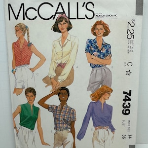 May include: A sewing pattern for a women's blouse with different sleeve and collar options. The pattern is from McCall's and is size 14 with a bust measurement of 36 inches. The pattern number is 7439.