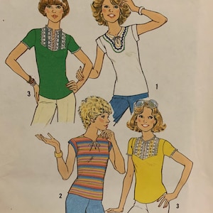 May include: A sewing pattern for three different tops, each requiring one yard or less of 60 inch fabric. The tops feature a variety of necklines and sleeve styles. The pattern is titled "One-Yard Tops".