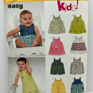 Puede incluir: Un patrón de costura para ropa de niños, con ocho diseños diferentes para vestidos, monos y petos. El patrón es de Newlook y está etiquetado como "fácil".