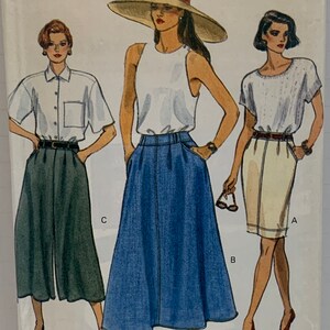 May include: Vogue Patterns sewing pattern showing three women in different outfits. The pattern number is 8007, with sizes 6-8-10. The outfits include a skirt, a tank top, a button-down shirt, and a skirt.
