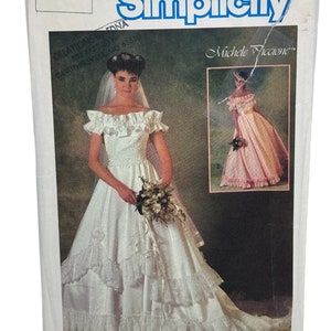 May include: Simplicity sewing pattern number 6766 for a wedding dress with a ruffled neckline and a full skirt. The pattern is designed by Michele Piccione.