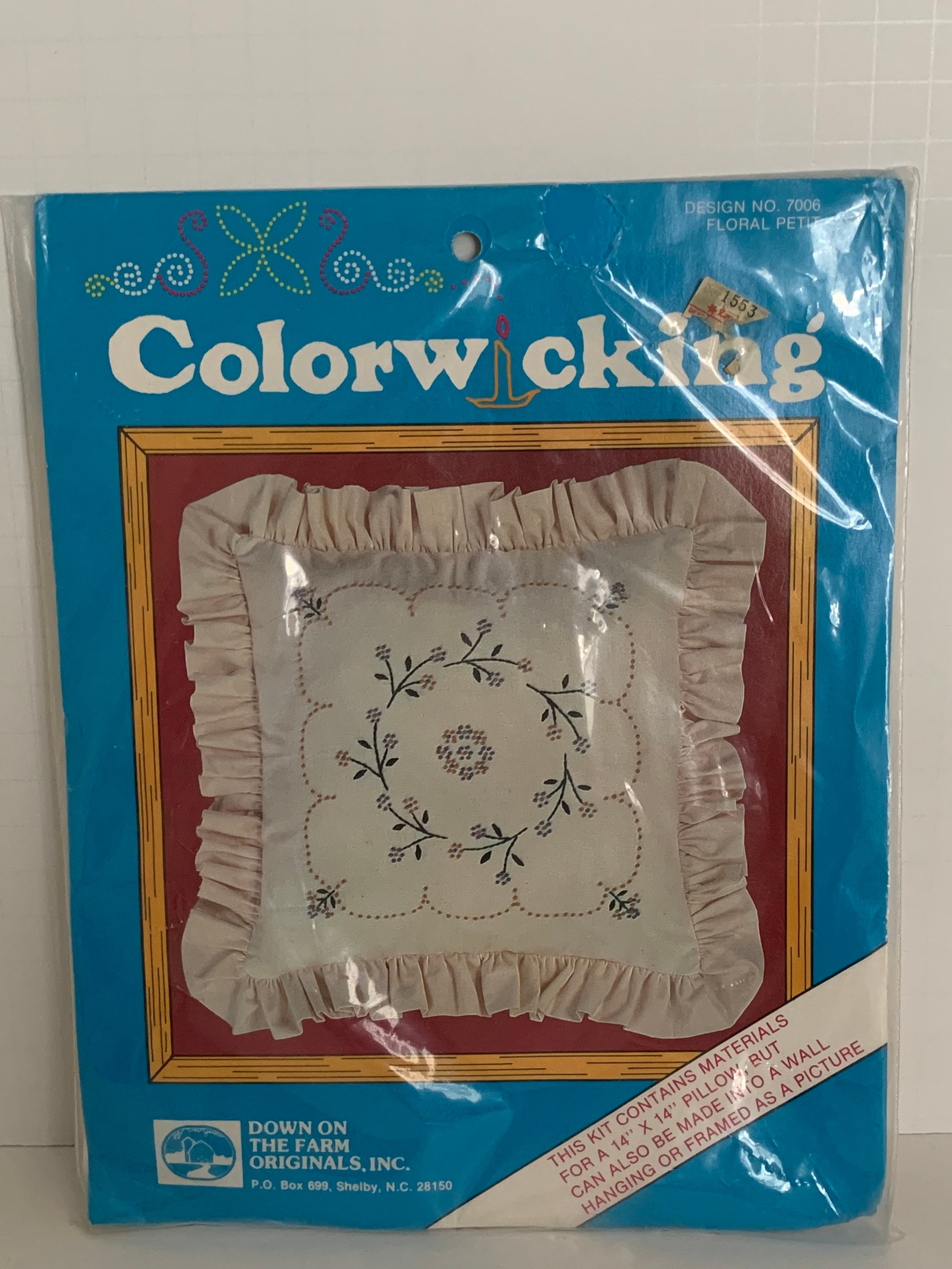 speldenkussen thema retro print in oranje en bruine tinten