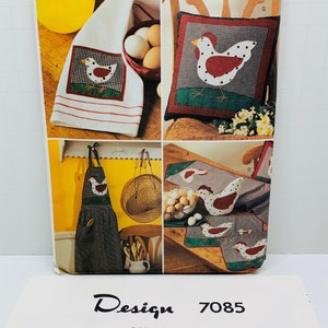 May include: A vintage sewing pattern for making three appliqued pot holders featuring a rooster and hen design. The pattern is called "Design 7085" and is from Butterick, size one. The pattern includes instructions and pieces for making the pot holders.