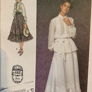 Può includere: Modello di cucito vintage per una blusa e una gonna bianche con un bordo in pizzo. Il modello è di Gunne Sax e si chiama "Jessica".