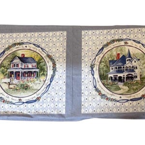 May include: Fabric panel featuring two circular illustrations of houses surrounded by floral wreaths. The houses are set against a light blue diamond pattern. The panel has blue and gold patterned borders.