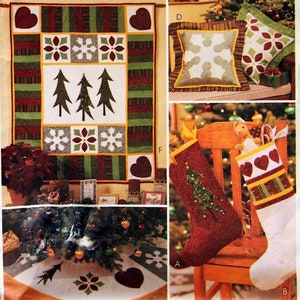 May include: A set of Christmas-themed quilted items, including a wall hanging, a table runner, two pillow covers, and two stocking designs. The designs feature a red and green color scheme with snowflakes, trees, and hearts.