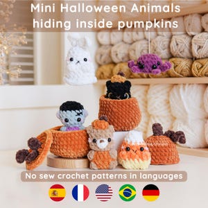 May include: A collection of handmade crochet Halloween animal figures, including a white bunny, a purple octopus, a black cat, a Frankenstein monster, a bear, and a candy corn, all nestled in orange pumpkin containers. The text reads "Mini Halloween Animals hiding inside pumpkins."