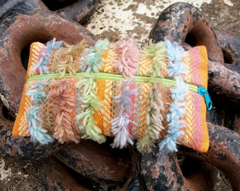 handwoven pencil case for pens and small items, orange violet turquoise green gray colorful, fringes organize in the handbag