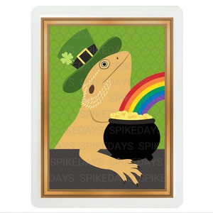 May include: A bearded dragon wearing a green leprechaun hat and holding a pot of gold at the end of a rainbow. The image is framed in gold.