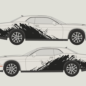 May include: Two white Dodge Challenger cars with black and white paint splatter designs. The cars are shown in profile view.