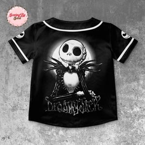 A black and white jersey with a graphic of the skeleton Jack from the movie "The Nightmare Before Christmas" printed on it.