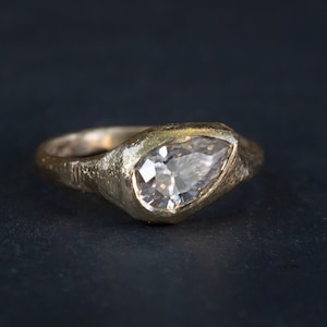 Slanted Pear, Signent Style Diamond Engagement Ring