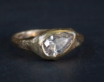 Slanted Pear, Signent Style Diamond Engagement Ring