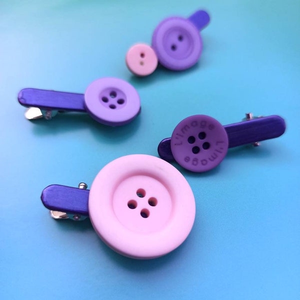 Ensemble de 4 petites barrettes à boutons mauve et rose