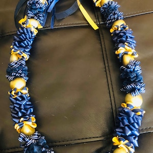 Ikaika (Strength) Kukui Nut Ribbon Lei