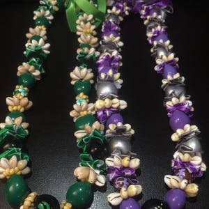 Hokeo-(to secretly love) - Kukui Nut Moneta Shell Ribbon Lei