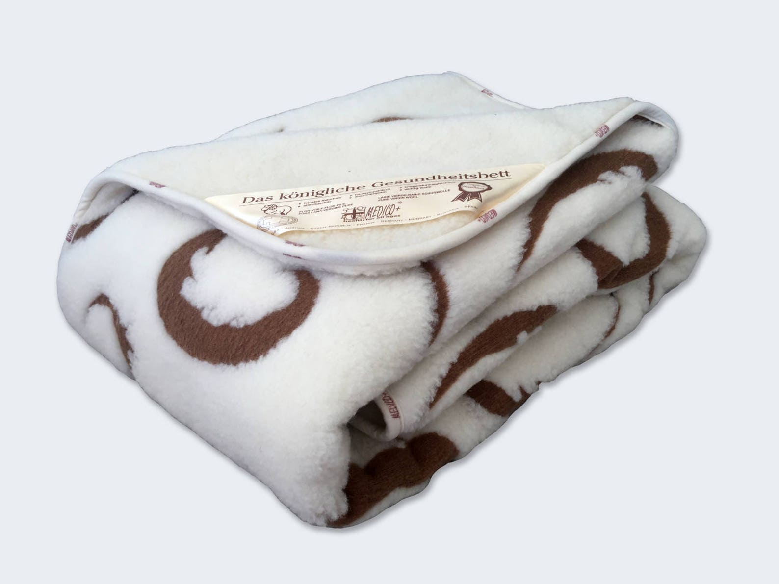 Одеяла теплые шерсть. Одеяло Woolmark из мериноса шерсти. Шерстяное одеяло меринос. Двойное одеяло из овечьей шерсти. Одеяло из козьей шерсти мериноса.